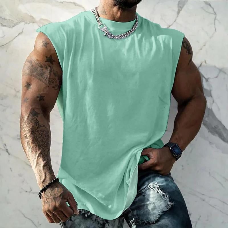 Camiseta deportiva sin mangas con cuello redondo y hombros anchos de color liso para hombre 44699991X