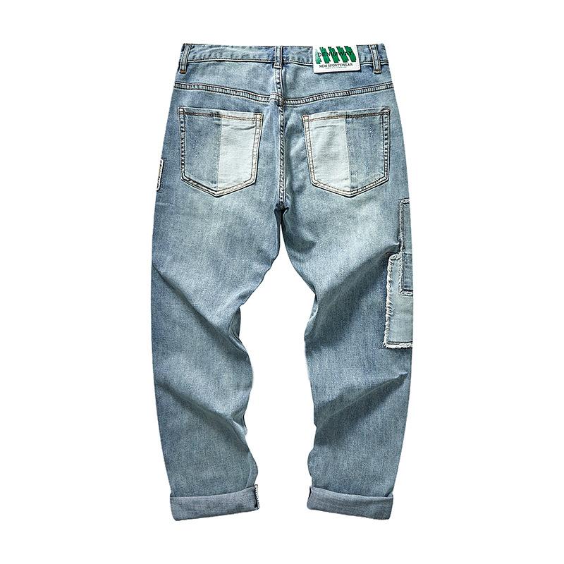 Herrejeans med lappeteppe og broderi 86112741Y