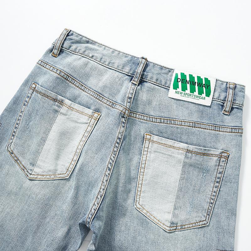 Herrejeans med lappeteppe og broderi 86112741Y