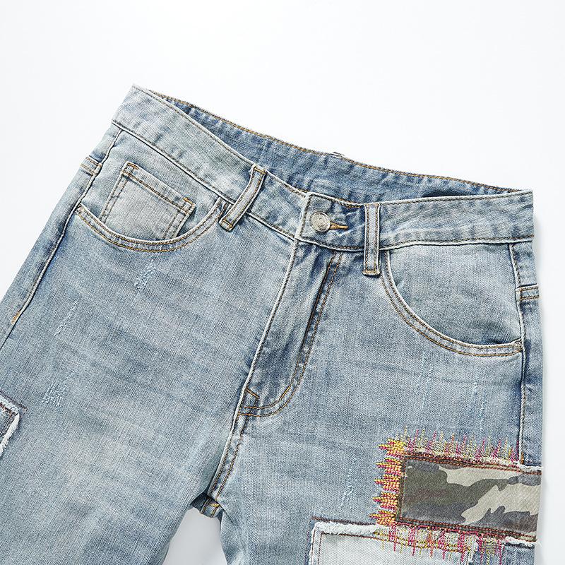 Herrejeans med lappeteppe og broderi 86112741Y
