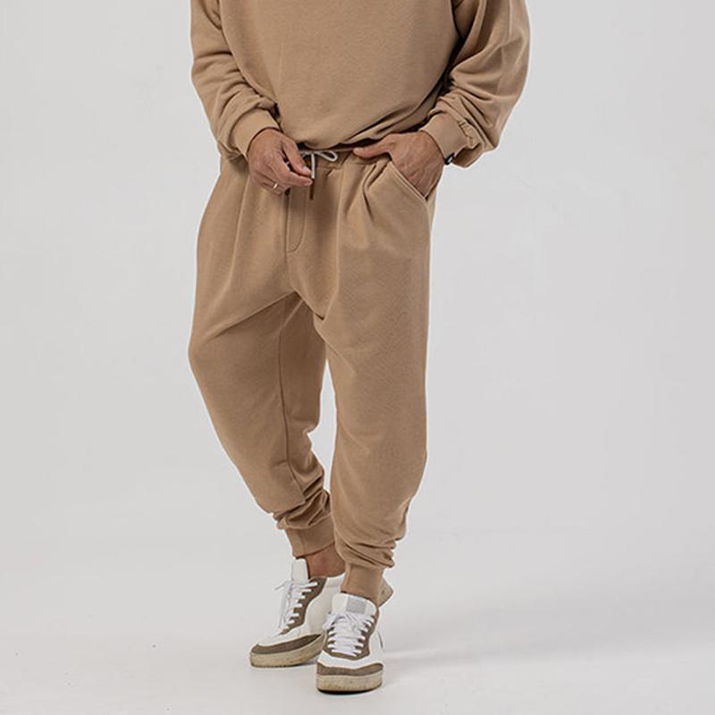 Pantalones deportivos casuales de cintura elástica y holgados de color sólido para hombre 49308794Z