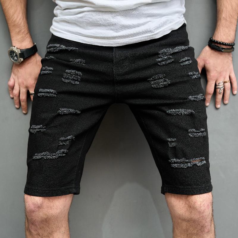 Schmale, gebürstete Jeans-Shorts für Herren mit lässigen Löchern 29690737Z