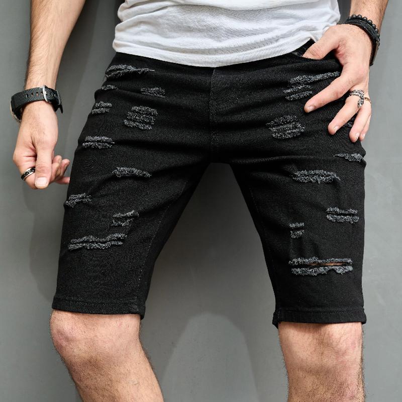 Schmale, gebürstete Jeans-Shorts für Herren mit lässigen Löchern 29690737Z