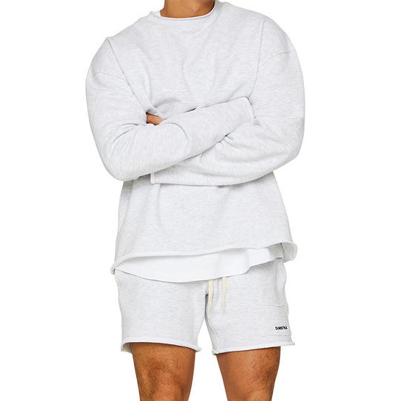 Conjunto de sudadera y pantalones cortos sueltos de color liso a la moda para hombre 47733694Z