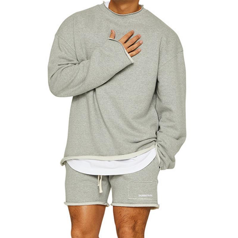 Conjunto de sudadera y pantalones cortos sueltos de color liso a la moda para hombre 47733694Z