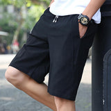 Men's Casual Solid Color Cotton Linen Elastic Waist Loose Shorts 00545243M