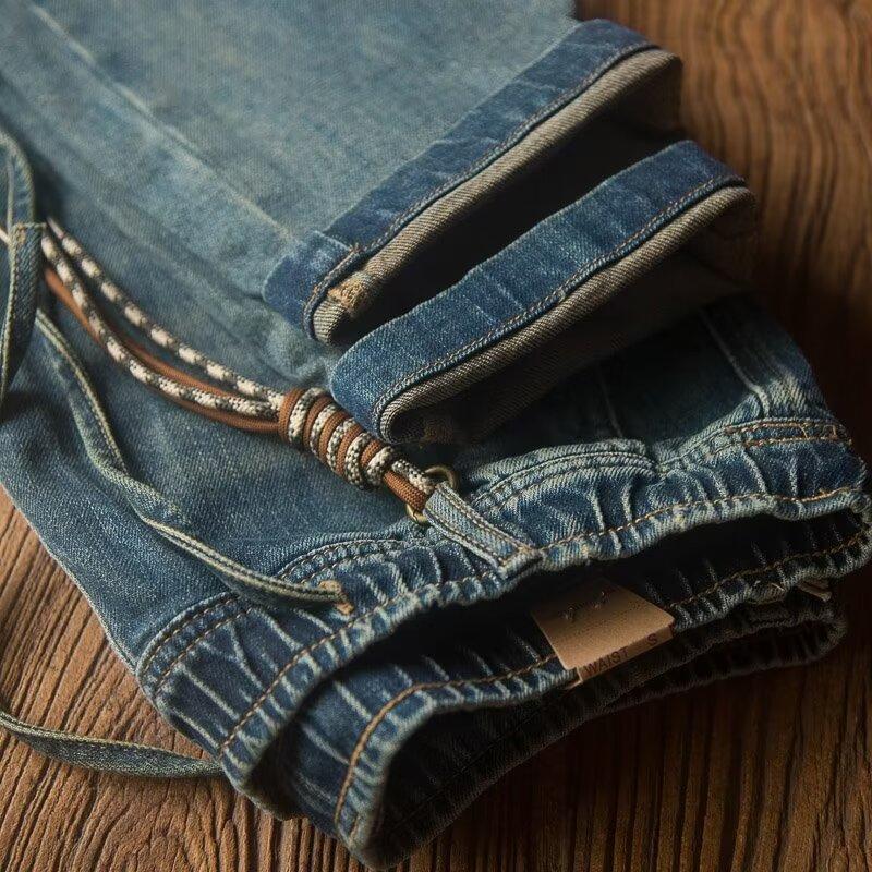 Lässige, einfarbige, gerade geschnittene Jeans mit Kordelzug für Herren 92815137Y