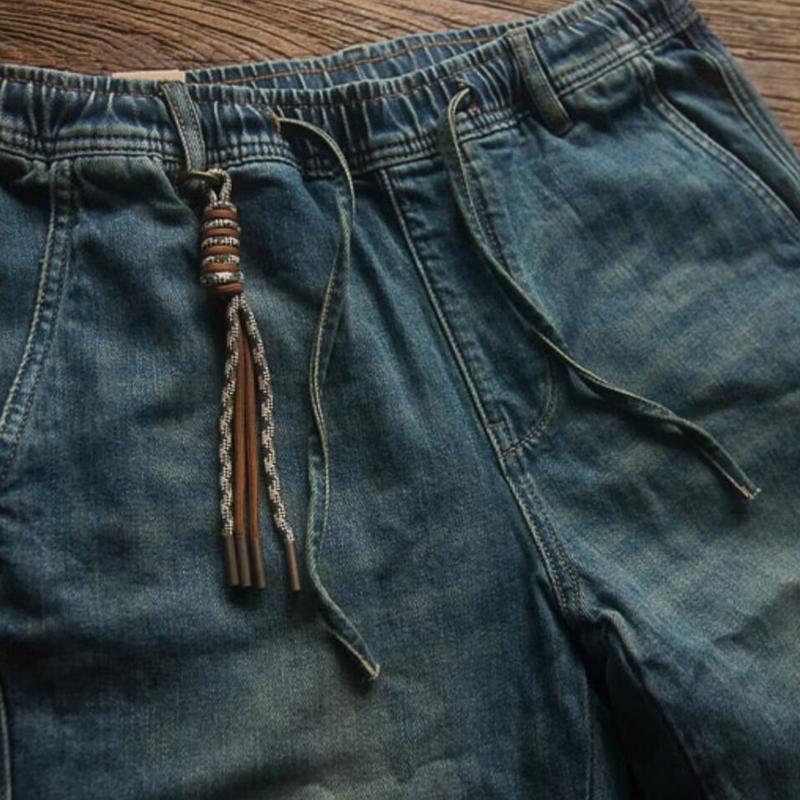 Lässige, einfarbige, gerade geschnittene Jeans mit Kordelzug für Herren 92815137Y