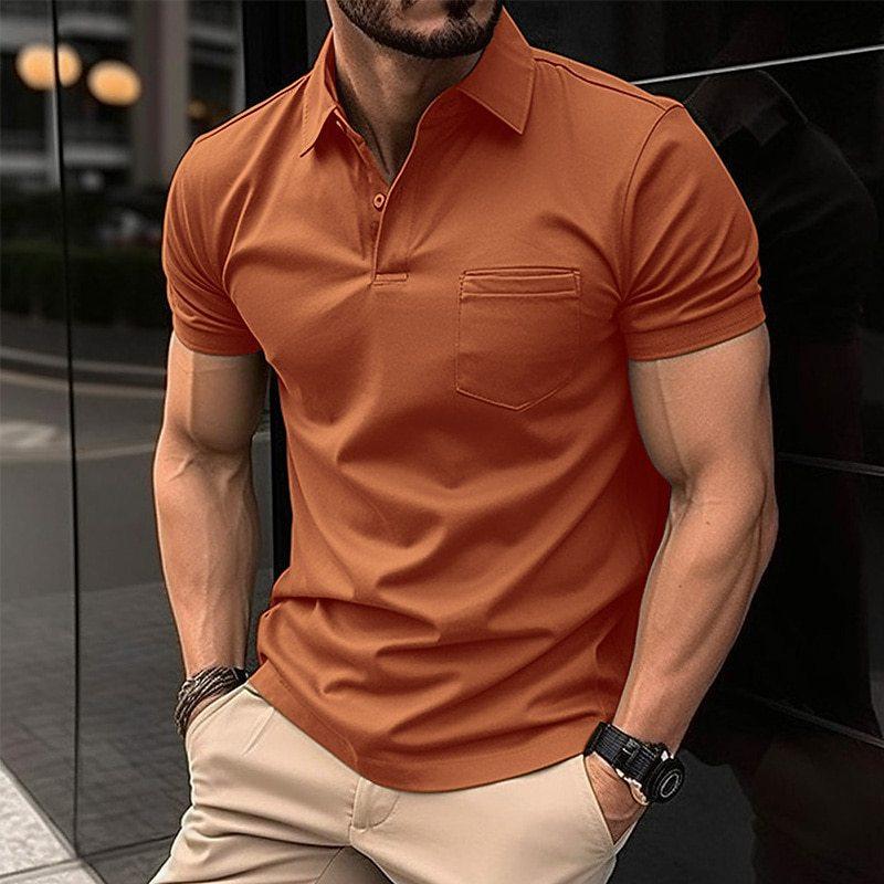 Camisa tipo polo deportiva de manga corta con solapa y bolsillo con botones en color liso para hombre 23463175X