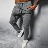 Men's Casual Solid Color Elastic Waist Loose Sports Pants 12510361M