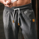 Men's Loose Drawstring Solid Color Sports Pants 88544830U