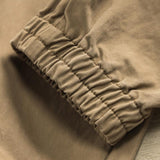 Men's Solid Color Loose Elastic Waist Cargo Pants 52957492Z