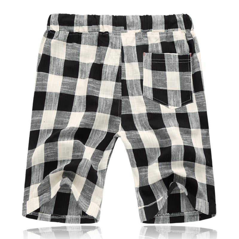 Pantalones cortos rectos de cintura elástica con rayas de lino y algodón para hombre 54118289M