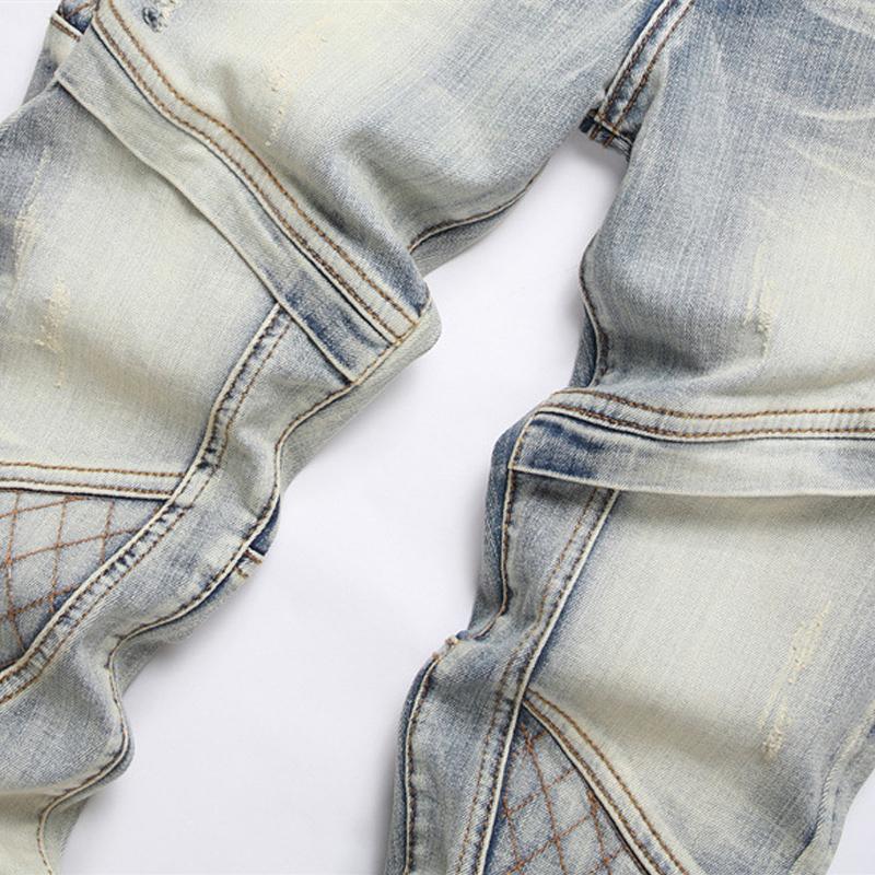 Jeans elasticizzati strappati con patchwork punk da uomo 32517765U