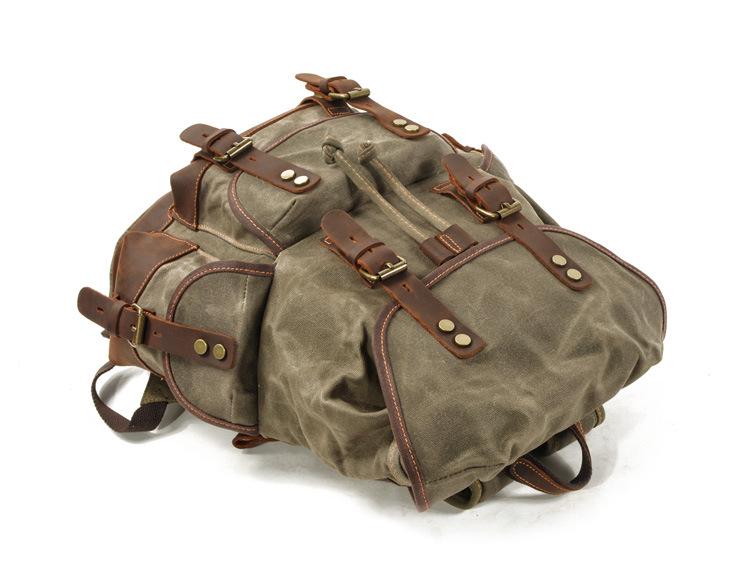 Mochila de lona vintage para hombre con múltiples bolsillos y costuras de cuero para exteriores 19083234Y