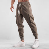 Men's Sports Solid Color Cotton Drawstring Multi-Pocket Trousers 54468776Y