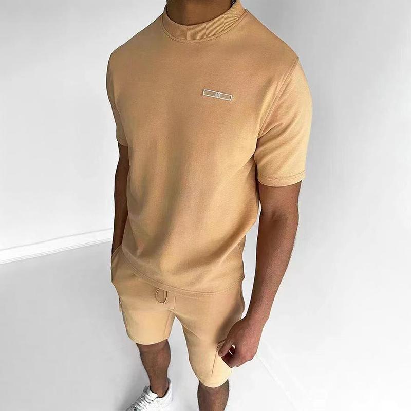 Conjunto deportivo informal de camiseta y pantalones cortos de manga corta con cuello redondo de color liso para hombre 25986168Z