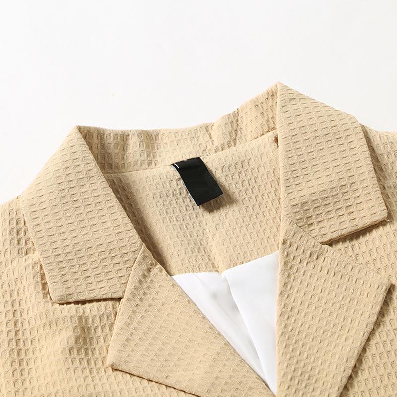 Blazer ajustado de un solo pecho con solapa con muesca y diseño de gofre de color liso para hombre 06434390Z