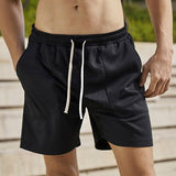 Men's Solid Loose Elastic Waist Sports Fitness Shorts 53632011Z