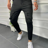Men's Solid Multi-pocket Elastic Waist Casual Sports Pants 84866782Z