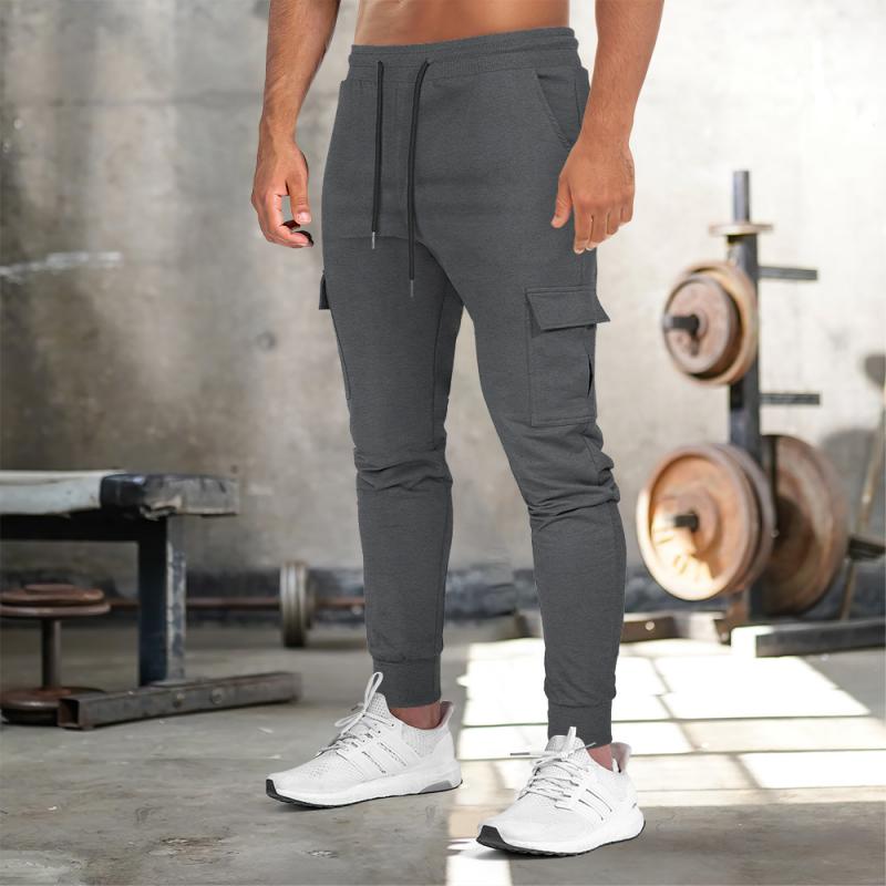 Men's Solid Multi-pocket Drawstring Elastic Waist Fitness Sports Pants 49940128Z