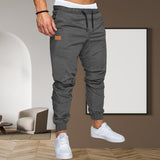 Men's Solid Elastic Waist Loose Cargo Pants 37767347Z