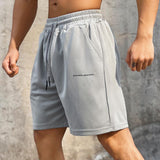 Men's Solid Elastic Waist Straight Loose Sports Shorts 56837204Z