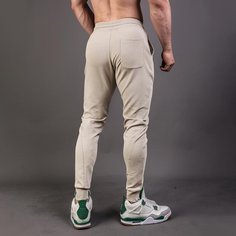 Men's Solid Stitching Elastic Waist Slim Fitness Sports Pants 93511839Z