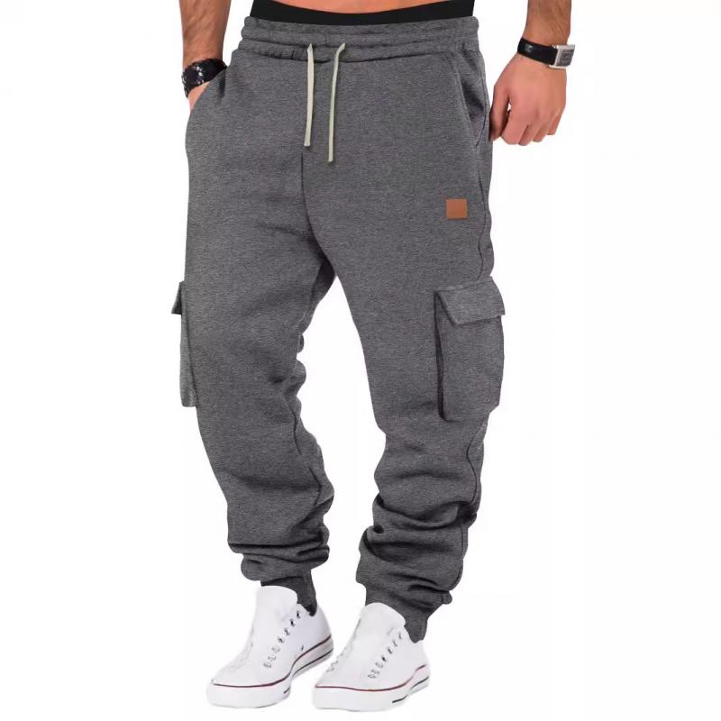 Pantalones deportivos multibolsillos de color liso para hombre 70234059Y