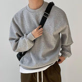 Men's Solid Loose Round Neck Long Sleeve Casual Sweatshirt 02294304Z