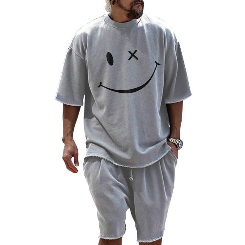 Modisches, lockeres Set aus kurzärmligem T-Shirt und Shorts mit Smiley-Print für Herren 66196672Z