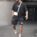 Men's Fashion Loose  Letter Print Short Sleeve T-shirt Multi-pocket Shorts Set 07780449Z