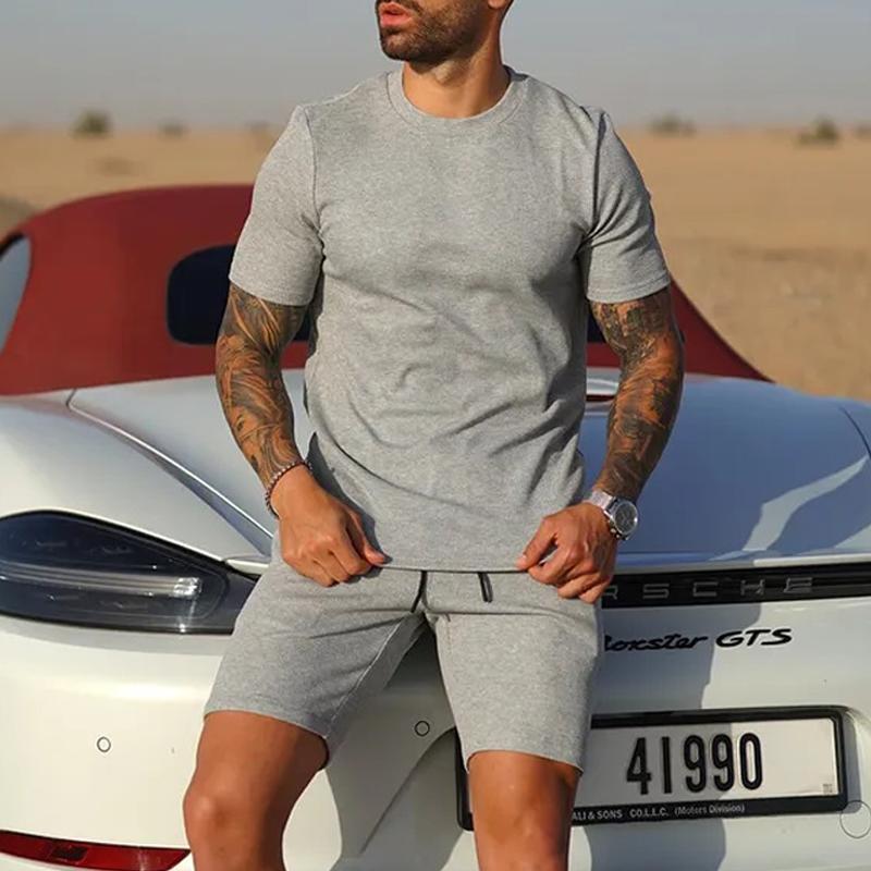 Conjunto de camiseta y pantalones cortos de manga corta con cuello redondo y sueltos de color liso para hombre 86538669Z